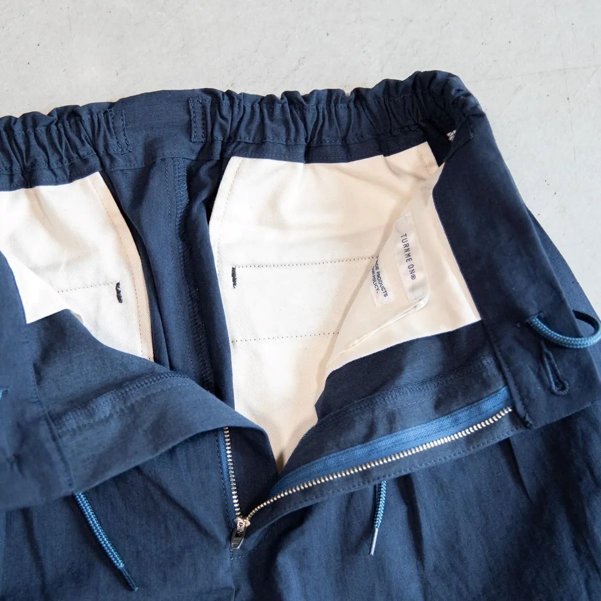 TURN ME ON ワイドテーパードパンツ (NAVY) | FLARY